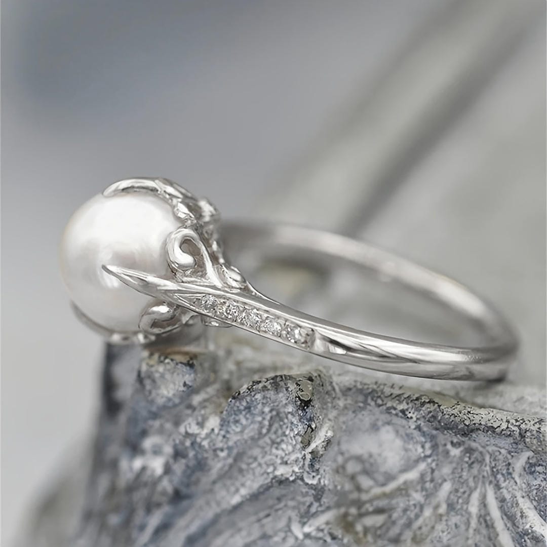 Silver / UK X½ | EU 67