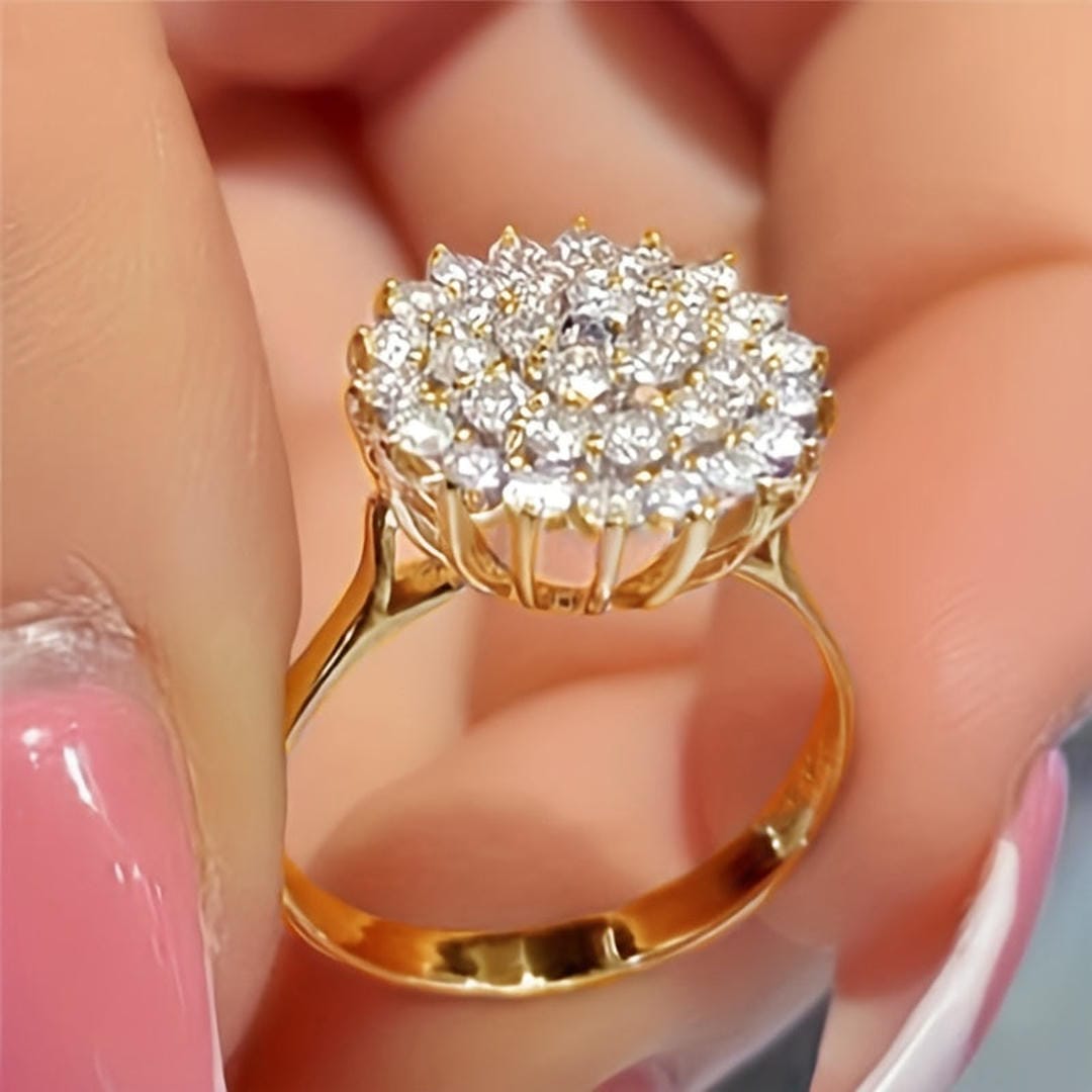 Gold / UK T½ | EU 62